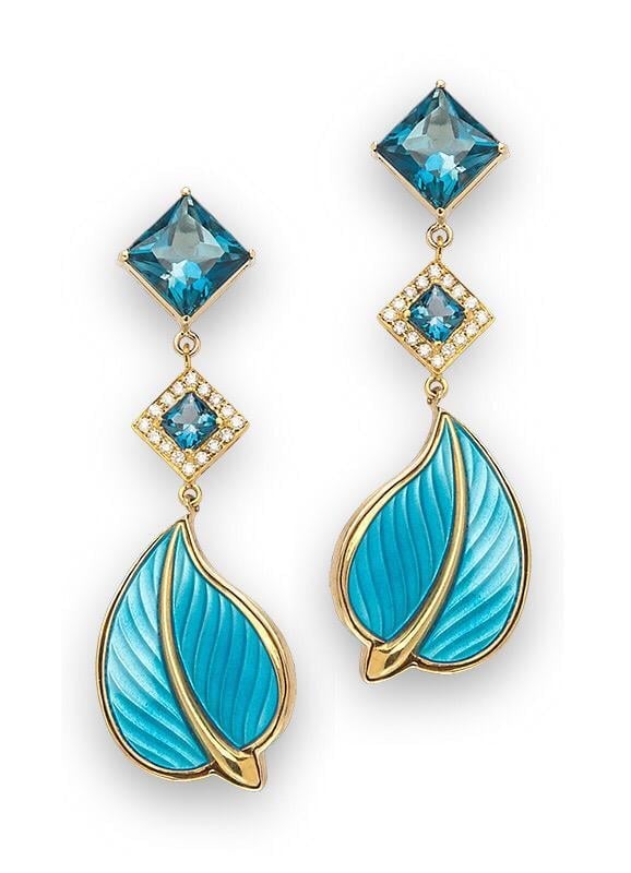 Pair of turquoise drop earrings with blue topaz stones and gold-framed leaf-shaped pendants